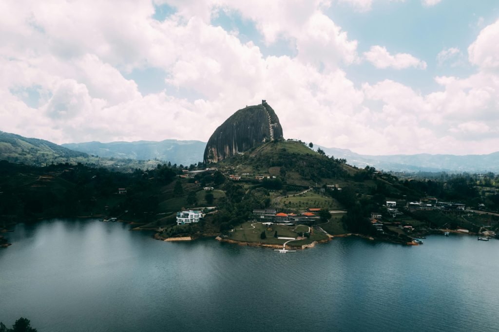 Stunning aerial view of the iconic El Peñol rock and surrounding landscape in Guatapé, Colombia. Guatapé