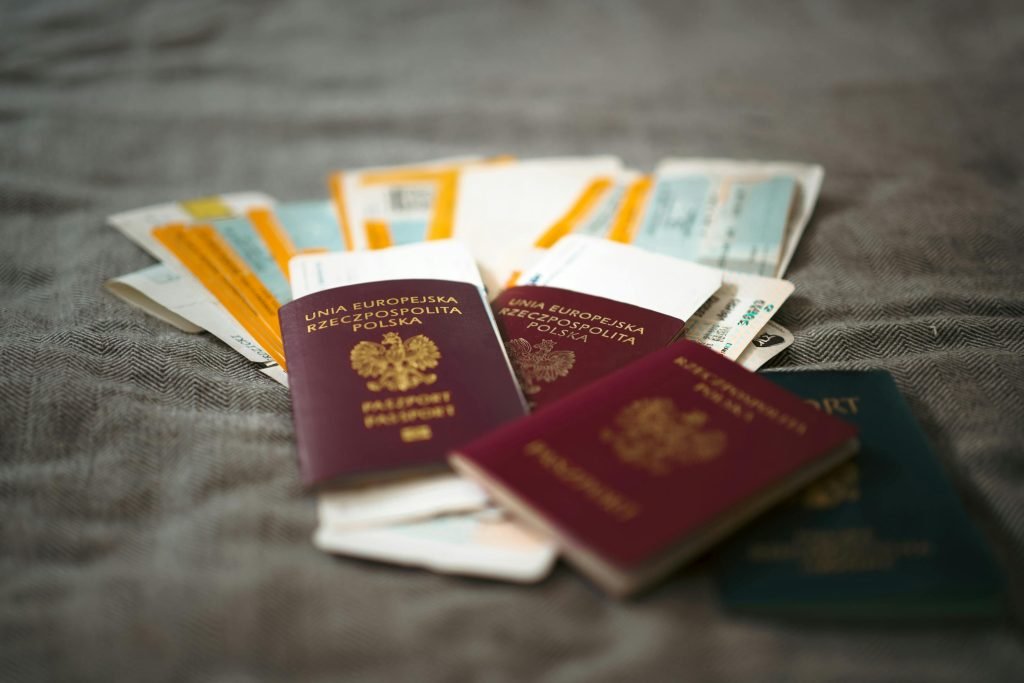Close-up of Polish passports and travel tickets symbolizing travel and adventure., visados