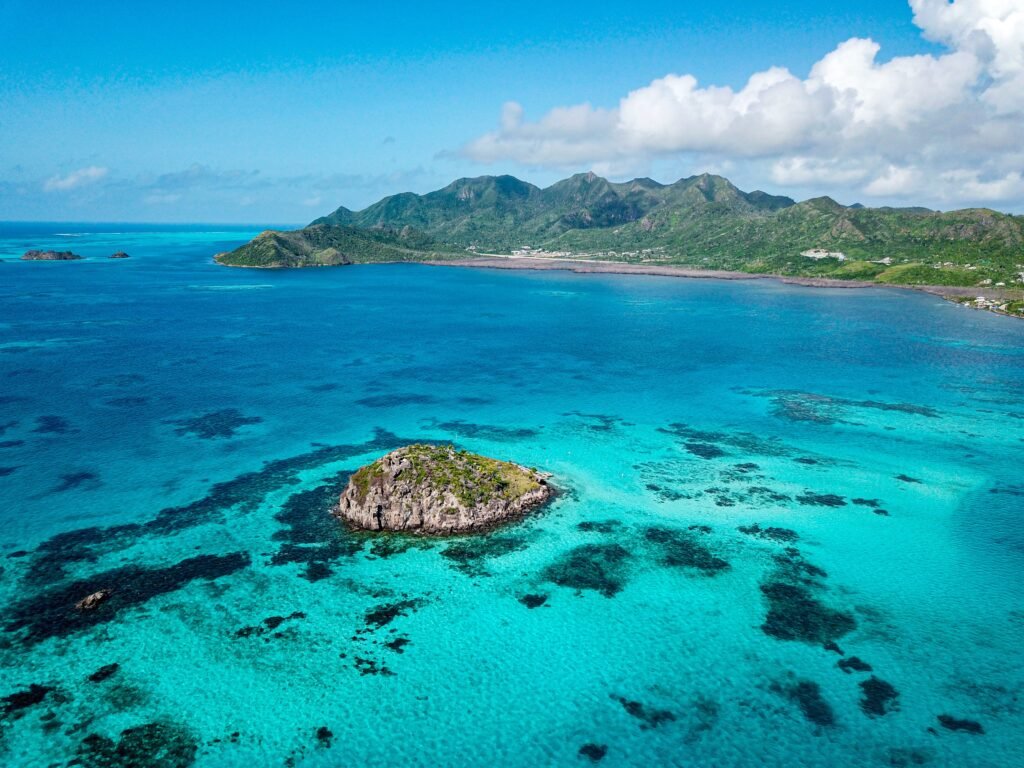 Breathtaking aerial shot of Providencia Island's clear turquoise waters and rugged coastline. Providencia