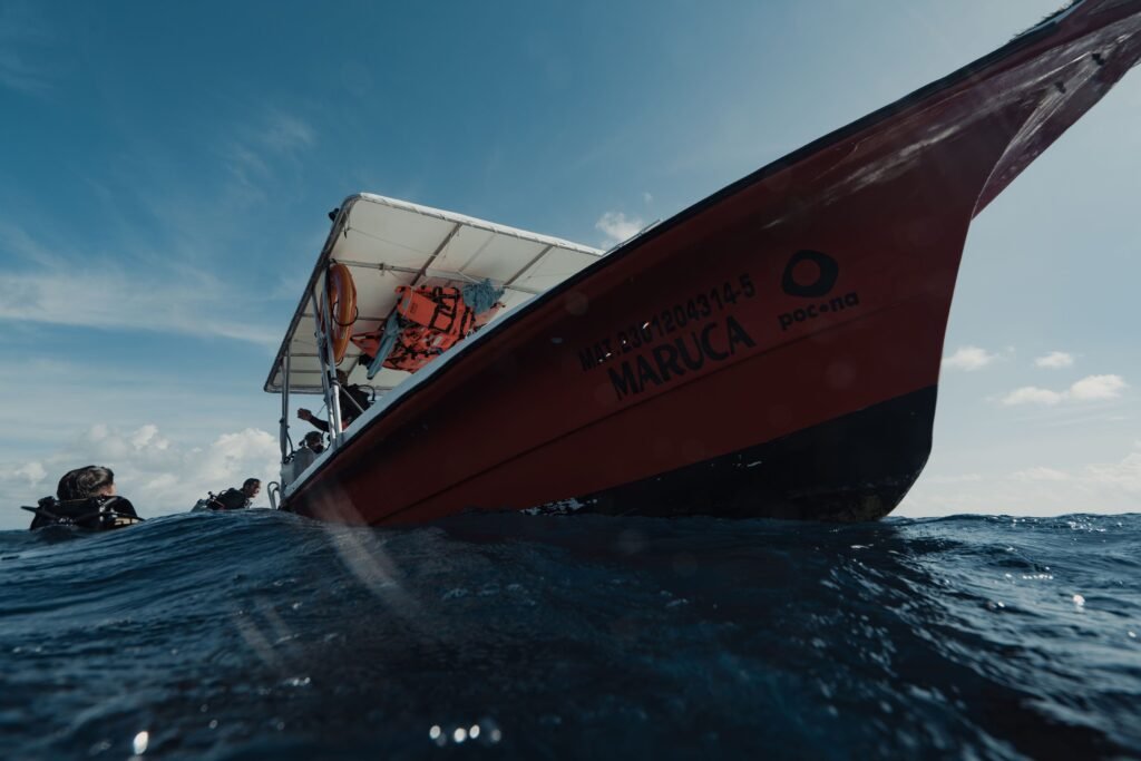 Experience a thrilling boat ride and diving adventure near Isla Mujeres, Mexico. islas del rosario