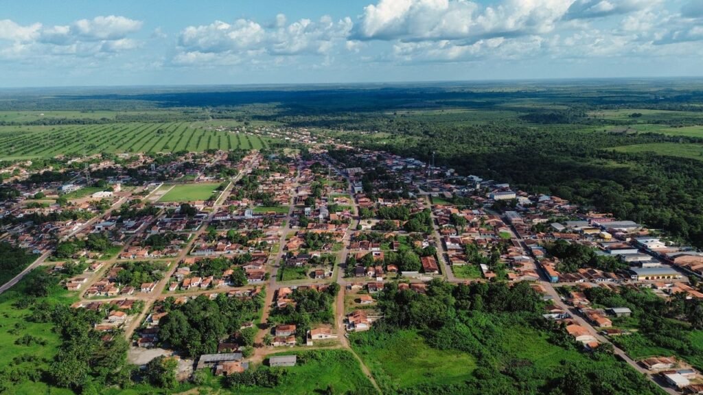 Aerial view of Garrafão do Norte town and surrounding lush fields in Brazil., Guaviare